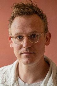 Daniel Rye as Photographer in The Hostage Takers 2023