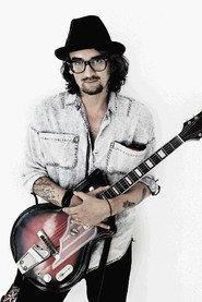 Dennis van Leeuwen as Guitar in Kane: With or Without You 1999