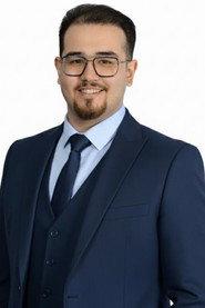 Tuğrul Akgün as Çağan in In the Event of Possible Delays