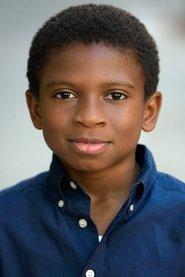 Chase W. Dillon as Travis in Haunted Mansion 2023