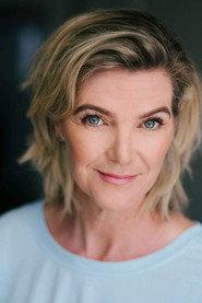 Gillian Baxter as Television Reporter in The Lunatics' Ball 1999