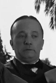 Mihalis Kalogiannis as Butler in Holidays in Aegina 1958