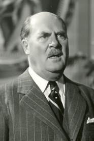 André Alerme as Mac Tavish in The Shanghai Drama 1938