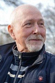 Jacek Brzostyński as Lector (voice) in Nobody Sleeps in the Woods Tonight 2 2021