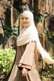 Erly Rika Wardani as Tini in Mbok Wantun & Anak-anaknya 2022