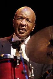 Ed Thigpen as Amerikaner in Charlie Butterfly 2002