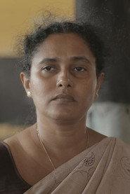 Priyanka Samaraweera as Sunanda in Death on a Full Moon Day 1997