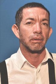 Ernesto Cantu as Theo Papaphillpou (Voice) in Moussaka & Chips 2005