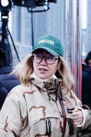 Yin Lu as Self in She and Her Two Minutes 2026