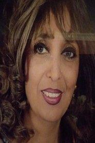 Maha Attia as مديحة in Return of the Fugitive 1990