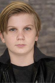 Owen Dammacco as Tim in A Holiday Homecoming 2021