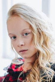 Riana Emma Balla as Emily Kovács in The Siege: Archangel One 2024