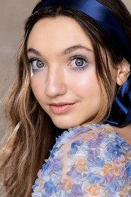 Angelina David as Student (Uncredited) in Poetic License 2025
