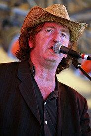 Jim Moginie as Himself - Guitar, keyboards, backup vocals in Midnight Oil - Black Rain Falls 1990