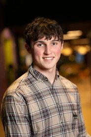 Ethan McCarron as Roan in Examination Assassination 2025