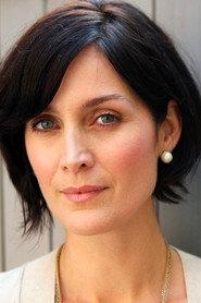 Carrie-Anne Moss as Natalie in Memento 2000