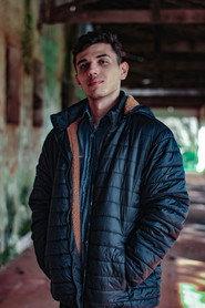 Thiago D'Araújo as Chris in Sombras que Ecoam 