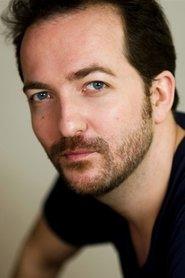 Sébastien Pierre as Police officer in À gauche en sortant de l'ascenseur 2015