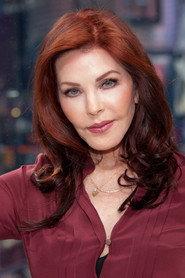 Priscilla Presley as Jane Spencer in The Naked Gun: From the Files of Police Squad! 1988