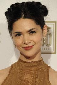 Lilan Bowden as Amber Kang in Who Killed Santa? A Murderville Murder Mystery 2022