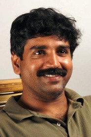 Kukku Surendran as Jomon in Snehapoorvam Anna 2000