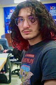 Nathan Vidal as Kyle Isinglass / News Reporter 1 in Just Another Case