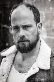 Jerod Blake as Officer in The Bad Orphan 2024