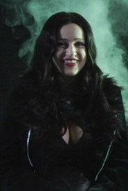Countess Samela as Lucia (segment "Blood Witch") in Faces of Schlock 2009