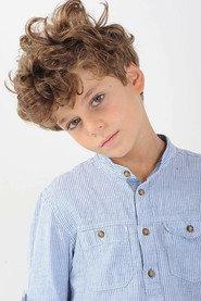 Christian Monaldi as Young Sorriso in ...Watch Out, We're Mad 2022