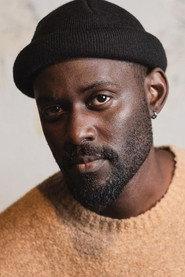 Maurice Kirya as Asimwe Patrick in The Girl in the Yellow Jumper 2020