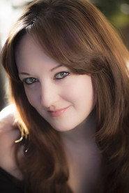 Chrissy Beyerlein as News Anchor in Voices Unheard 