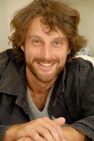 Massimo Reale as Amos Menegazzi in Cronaca Nera: Il Portiere Distratto 1998