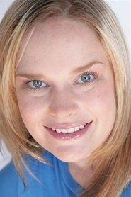 Katy Magnuson as Lily Renton in Busty Cops Go Hawaiian 2010