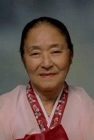 Kim Ae-ra as Old Woman in Out to the World 1994