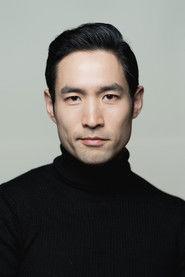 Joo Young-ho as President Richard Liu in The American 2025