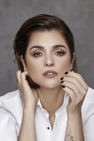 Araceli González as Tati / Brenda in A Day in Paradise 2003