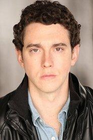 Austin Freeman as Michael Tate in The Stranger She Brought Home 2021