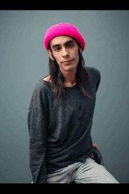 Andrew Estrella as Skinny Man in The Lost Arm of God 2025