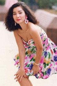 Chen Meifeng as Lu Danian's ex-girlfriend in The Green, Green Grass of Home 1982