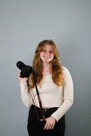 Evie Strope as Modelling Photographer in Call of the Vulture 2025