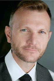 Cameron Pow as George La Monte in The Tramp's New World 2021