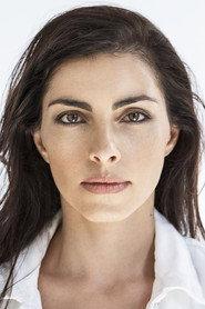Kika Georgiou as Medina in The Enforcer 2022