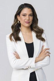 Lital Shemesh as News Broadcaster Lital Shemesh in PRIME TIME MOM 2024