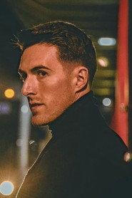 Brendan Charles as Brian in American Resolve 2021
