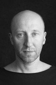 Cezary Kosiński as Janek's Father in The Treasurer 2025