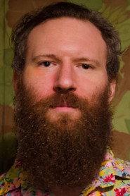 Evan Leed as Tío Bianca / Hombre Traje Amarillo in Red Sky (Metal Giants) 2022