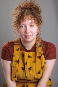 Erin Maria Walther as Lizzie Evans in Remi Milligan: Lost Director 2025