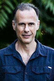Yorgos Glastras as Kosmas in Rouleman 2005
