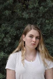 Grace Blomfield as Alien (Voice) in The Dropoff 2024
