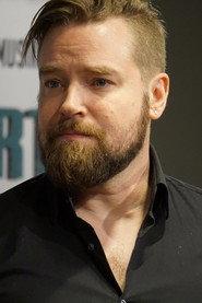 Jari Ahola as Chief of Security Mikhail Garybrandy in Star Wreck: In the Pirkinning 2005